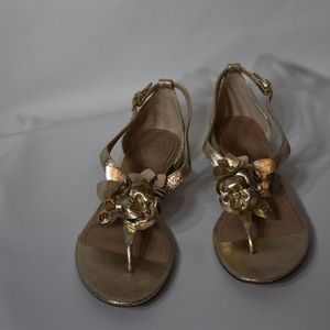 Gold leather Tory Burch sandal.